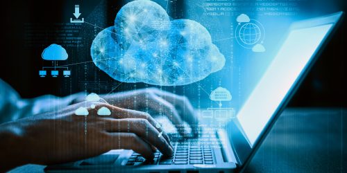 Cloud computing technology and online data storage for business network concept. Computer connects to internet server service for cloud data transfer presented in 3D futuristic graphic interface. uds